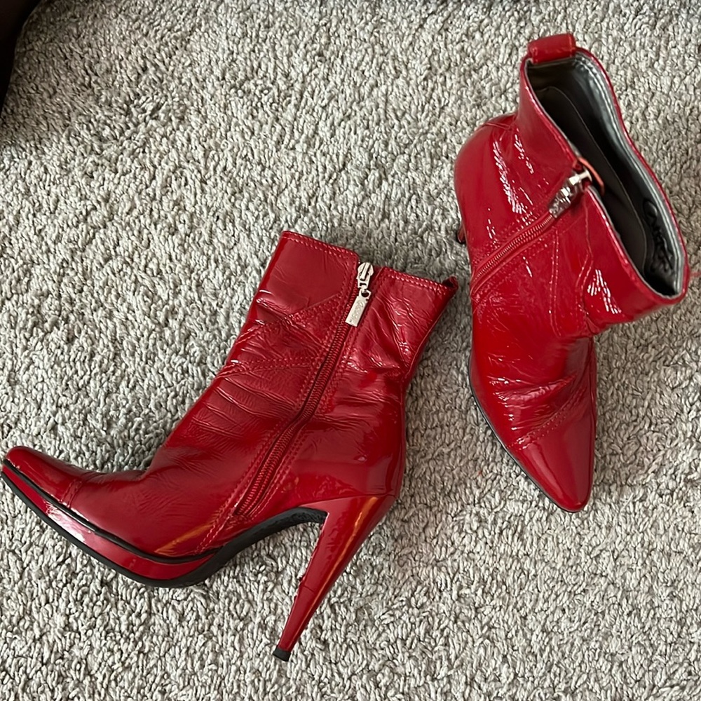 Carlos Santana red heel boots